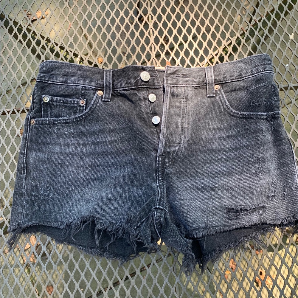Black Levi 501 cutoff jean shorts.